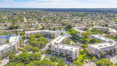 JUST REDUCED! WATERFRONT! Sunrise Lakes Community Offers this on Sunrise Lakes Phase IV Golf Course in Florida - for sale on GolfHomes.com, golf home, golf lot