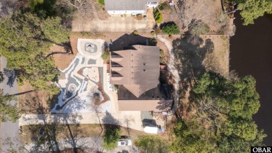 Don't miss out on this incredible canal-front home situated on on Duck Woods Country Club in North Carolina - for sale on GolfHomes.com, golf home, golf lot