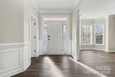 Updated 5-bedroom, 2.5-bath home located in the Highland Creek on Highland Creek Golf Club in North Carolina - for sale on GolfHomes.com, golf home, golf lot