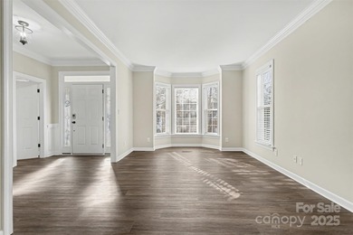 Updated 5-bedroom, 2.5-bath home located in the Highland Creek on Highland Creek Golf Club in North Carolina - for sale on GolfHomes.com, golf home, golf lot