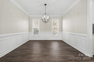 Updated 5-bedroom, 2.5-bath home located in the Highland Creek on Highland Creek Golf Club in North Carolina - for sale on GolfHomes.com, golf home, golf lot