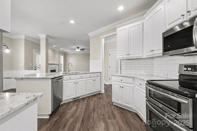 Updated 5-bedroom, 2.5-bath home located in the Highland Creek on Highland Creek Golf Club in North Carolina - for sale on GolfHomes.com, golf home, golf lot