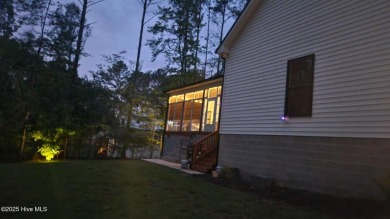 Welcome to beautiful home on large lot in gated community of on River Golf and County Club at Lake Royale in North Carolina - for sale on GolfHomes.com, golf home, golf lot