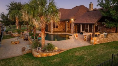 Stunning waterfront home in the coveted community of The Island on Harbor Lakes Golf Club in Texas - for sale on GolfHomes.com, golf home, golf lot