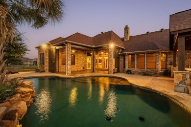 Stunning waterfront home in the coveted community of The Island on Harbor Lakes Golf Club in Texas - for sale on GolfHomes.com, golf home, golf lot