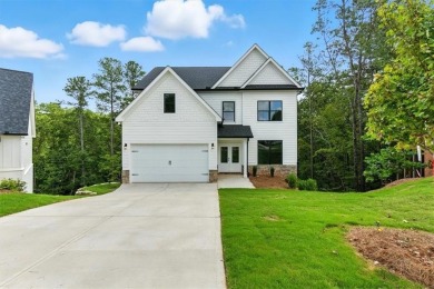 Welcome Home to 29 Creekview Drive! This stunning Alexander on The Plantation Golf Club in Georgia - for sale on GolfHomes.com, golf home, golf lot