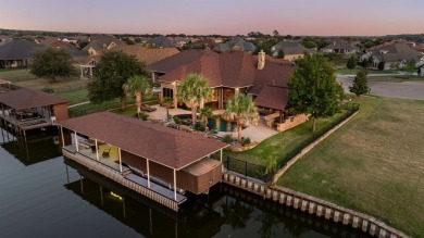 Stunning waterfront home in the coveted community of The Island on Harbor Lakes Golf Club in Texas - for sale on GolfHomes.com, golf home, golf lot