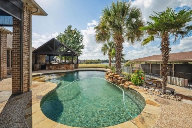 Stunning waterfront home in the coveted community of The Island on Harbor Lakes Golf Club in Texas - for sale on GolfHomes.com, golf home, golf lot