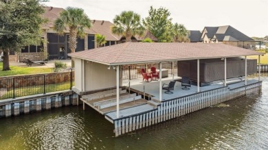 Stunning waterfront home in the coveted community of The Island on Harbor Lakes Golf Club in Texas - for sale on GolfHomes.com, golf home, golf lot