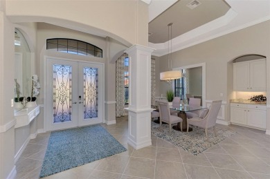 Welcome to 25261 Spartina Drive, the epitome of elegance in the on Sarasota National Golf Club in Florida - for sale on GolfHomes.com, golf home, golf lot