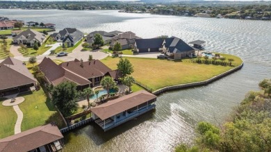 Stunning waterfront home in the coveted community of The Island on Harbor Lakes Golf Club in Texas - for sale on GolfHomes.com, golf home, golf lot