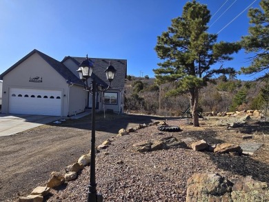 Experience this oasis on the bluff with incredible views of the on Hollydot Golf Course in Colorado - for sale on GolfHomes.com, golf home, golf lot