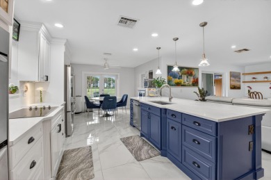 Welcome home! Come see this beautifully updated 3 bedroom 2 bath on Boca Dunes Golf and Country Club in Florida - for sale on GolfHomes.com, golf home, golf lot