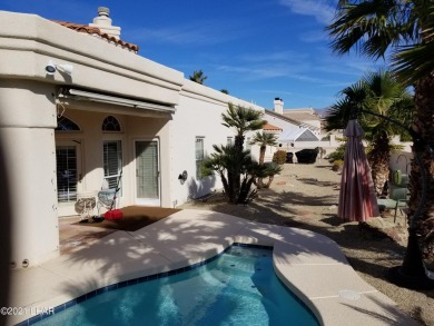 Gorgeous home located in the prestigious Residential Estates on London Bridge Golf Course in Arizona - for sale on GolfHomes.com, golf home, golf lot