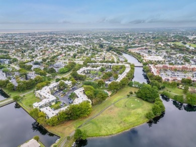 Charming 2BR/2BA corner unit ideally located just steps from the on Colony West Country Club in Florida - for sale on GolfHomes.com, golf home, golf lot