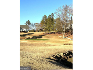 Build your dream home on this .53 acre vacant wooded lot with on Meadow Lakes Golf Course in Georgia - for sale on GolfHomes.com, golf home, golf lot