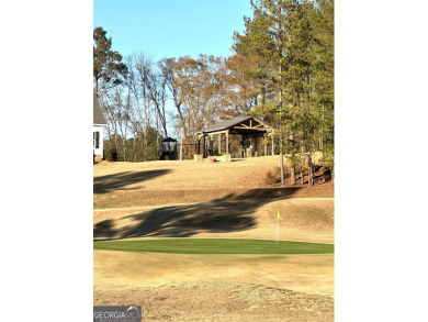 Build your dream home on this .53 acre vacant wooded lot with on Meadow Lakes Golf Course in Georgia - for sale on GolfHomes.com, golf home, golf lot