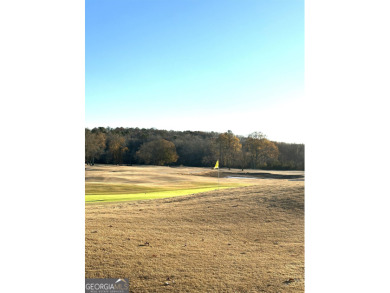 Build your dream home on this .53 acre vacant wooded lot with on Meadow Lakes Golf Course in Georgia - for sale on GolfHomes.com, golf home, golf lot