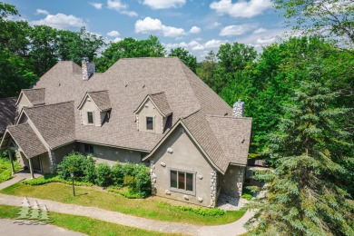 Discover the epitome of luxury at 915 Chardonnay Ln, Including on Garland Resort and Golf Club  in Michigan - for sale on GolfHomes.com, golf home, golf lot