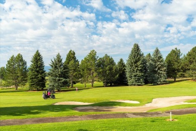 Nestled on the scenic Eagle Bend Golf Course, this lovely on Eagle Bend Golf Course in Montana - for sale on GolfHomes.com, golf home, golf lot