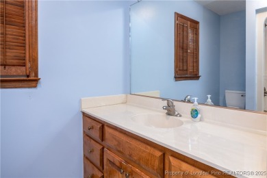 Welcome to this charming 3-bedroom, 2.5-bath home on Hole One of on Sandy Ridge Country Club in North Carolina - for sale on GolfHomes.com, golf home, golf lot