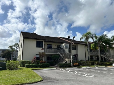 Beautifully renovated 2nd floor corner condo with expansive on Forest Oaks Golf Club in Florida - for sale on GolfHomes.com, golf home, golf lot