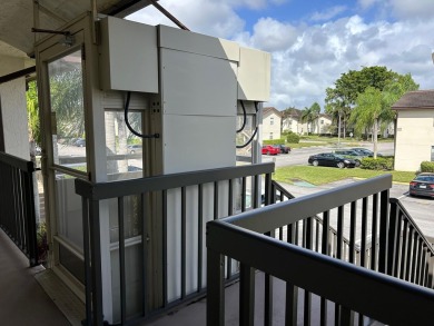 Beautifully renovated 2nd floor corner condo with expansive on Forest Oaks Golf Club in Florida - for sale on GolfHomes.com, golf home, golf lot