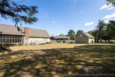 Welcome to this charming 3-bedroom, 2.5-bath home on Hole One of on Sandy Ridge Country Club in North Carolina - for sale on GolfHomes.com, golf home, golf lot