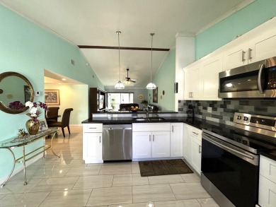 Beautifully renovated 2nd floor corner condo with expansive on Forest Oaks Golf Club in Florida - for sale on GolfHomes.com, golf home, golf lot