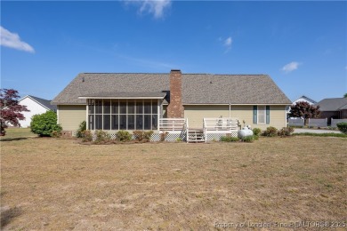 Welcome to this charming 3-bedroom, 2.5-bath home on Hole One of on Sandy Ridge Country Club in North Carolina - for sale on GolfHomes.com, golf home, golf lot