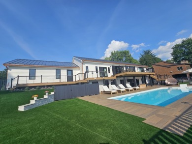 Professionally designed Lake house on a double waterfront lot on Treasure Lake - Gold in Pennsylvania - for sale on GolfHomes.com, golf home, golf lot