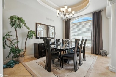 Nestled within an exclusive gated golf course community, this on Spirit Hollow Golf Course in Iowa - for sale on GolfHomes.com, golf home, golf lot