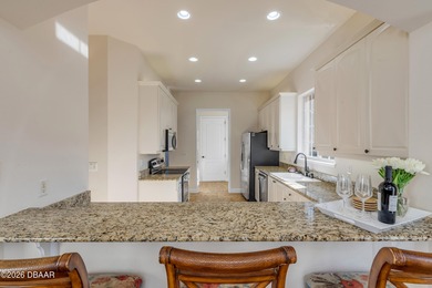 STOP SCROLLING - this is the END UNIT lakefront home you've been on Halifax Plantation Golf Club in Florida - for sale on GolfHomes.com, golf home, golf lot