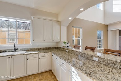 STOP SCROLLING - this is the END UNIT lakefront home you've been on Halifax Plantation Golf Club in Florida - for sale on GolfHomes.com, golf home, golf lot