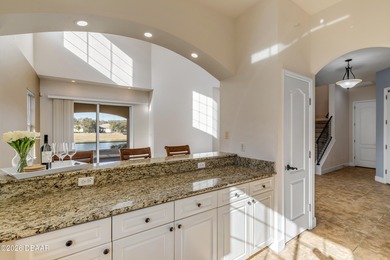 STOP SCROLLING - this is the END UNIT lakefront home you've been on Halifax Plantation Golf Club in Florida - for sale on GolfHomes.com, golf home, golf lot