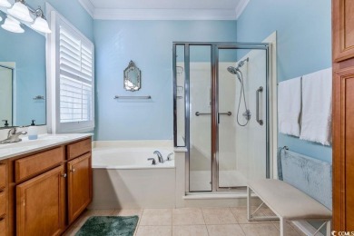 Discover this lovingly maintained 4-bedroom, 3-bath home in the on International Club of Myrtle Beach in South Carolina - for sale on GolfHomes.com, golf home, golf lot