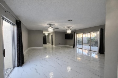 Welcome home! Fully renovated luxury patio home stands far above on Poinciana Golf Club in Florida - for sale on GolfHomes.com, golf home, golf lot