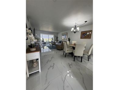 A beautifully remodeled two-bedroom, two-bathroom apartment on Sunrise Lakes Phase IV Golf Course in Florida - for sale on GolfHomes.com, golf home, golf lot