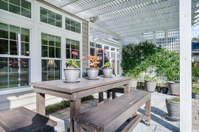 Discover this lovingly maintained 4-bedroom, 3-bath home in the on International Club of Myrtle Beach in South Carolina - for sale on GolfHomes.com, golf home, golf lot