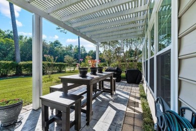 Discover this lovingly maintained 4-bedroom, 3-bath home in the on International Club of Myrtle Beach in South Carolina - for sale on GolfHomes.com, golf home, golf lot