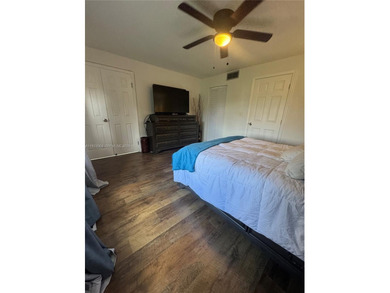 A beautifully remodeled two-bedroom, two-bathroom apartment on Sunrise Lakes Phase IV Golf Course in Florida - for sale on GolfHomes.com, golf home, golf lot