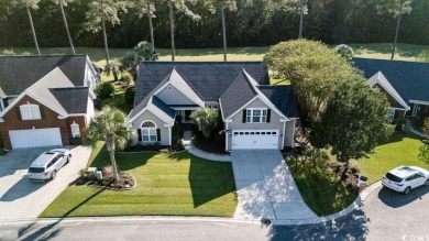 Discover this lovingly maintained 4-bedroom, 3-bath home in the on International Club of Myrtle Beach in South Carolina - for sale on GolfHomes.com, golf home, golf lot