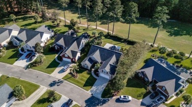 Discover this lovingly maintained 4-bedroom, 3-bath home in the on International Club of Myrtle Beach in South Carolina - for sale on GolfHomes.com, golf home, golf lot
