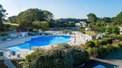 Discover this lovingly maintained 4-bedroom, 3-bath home in the on International Club of Myrtle Beach in South Carolina - for sale on GolfHomes.com, golf home, golf lot