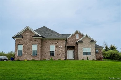 Stunning 3 bedroom, 2 bath home in the prestigious Metamora Golf on Metamora Country Club in Michigan - for sale on GolfHomes.com, golf home, golf lot