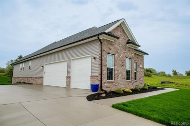 Stunning 3 bedroom, 2 bath home in the prestigious Metamora Golf on Metamora Country Club in Michigan - for sale on GolfHomes.com, golf home, golf lot