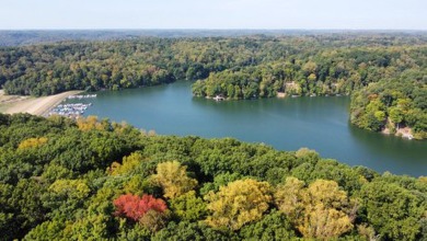 Double lot wooded property in Hocking Hills near the entrance in on Hide-A-Way Hills Golf Club in Ohio - for sale on GolfHomes.com, golf home, golf lot