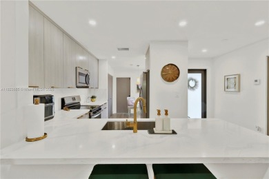 Stunning fully renovated 3-bed, 2-bath townhouse in The on Jim McLean Signature Course in Florida - for sale on GolfHomes.com, golf home, golf lot