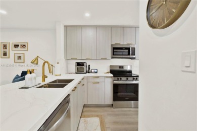 Stunning fully renovated 3-bed, 2-bath townhouse in The on Jim McLean Signature Course in Florida - for sale on GolfHomes.com, golf home, golf lot