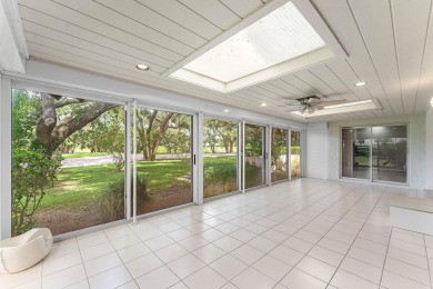 Photos feature remodel concept renderings.Set on a quiet on  in Florida - for sale on GolfHomes.com, golf home, golf lot